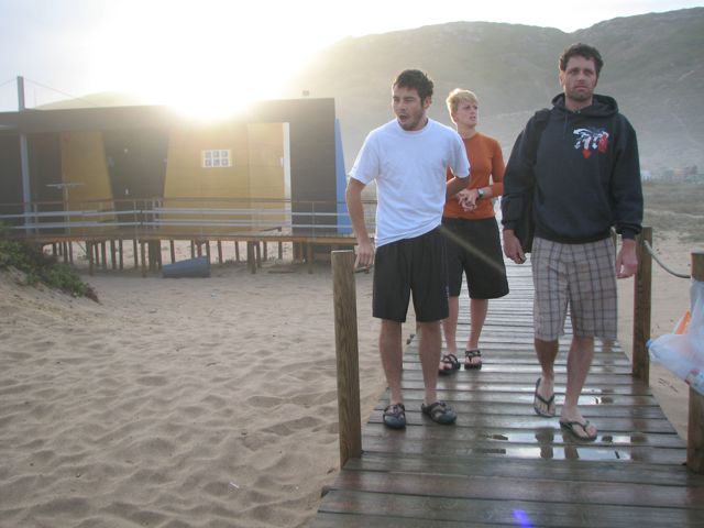 morningimg_6613 Three groggy campers aproach the beach on Thursday morning to check the surf conditions. My teammates and roomies from left to right are Andy Gates, Lindsay Usher and Joey Hall.