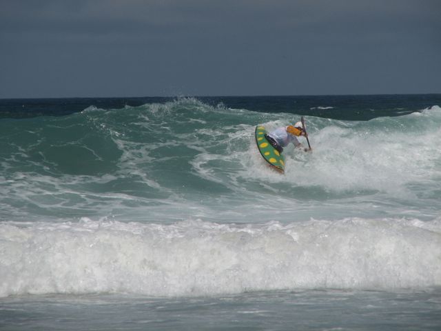 russhpmensimg_6773 Russ Buskirk making a remarkable comeback after an all out ass pounding (pardon the expression but there's no other way to describe it) in the shorebreak. Russ surfed two waves and eliminated a very highly ranked paddler.